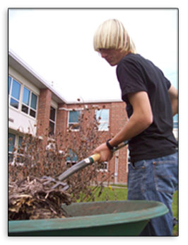 Evan pitching into a wheelbarrow